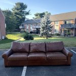 Pottery Barn Turner roll arm leather sofa in cognac brown