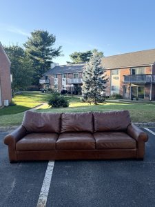 Pottery Barn Turner roll arm leather sofa in cognac brown