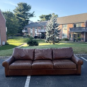 Pottery Barn Turner roll arm leather sofa in cognac brown